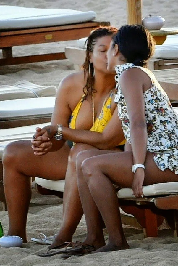 Queen Latifah kissing Eboni Nichols