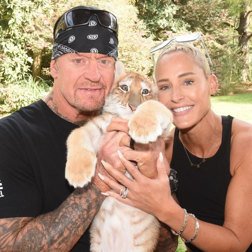 Michelle McCool With Wrestler The Undertaker Wellinfoprovider